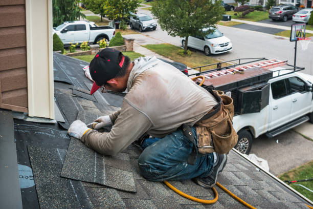 Professional Emergency Roof Repair technician working in Wilkeson, WA